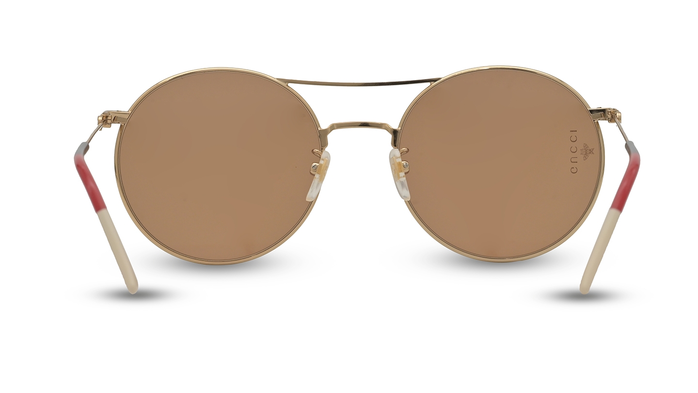 Gucci sunglasses round gold hotsell