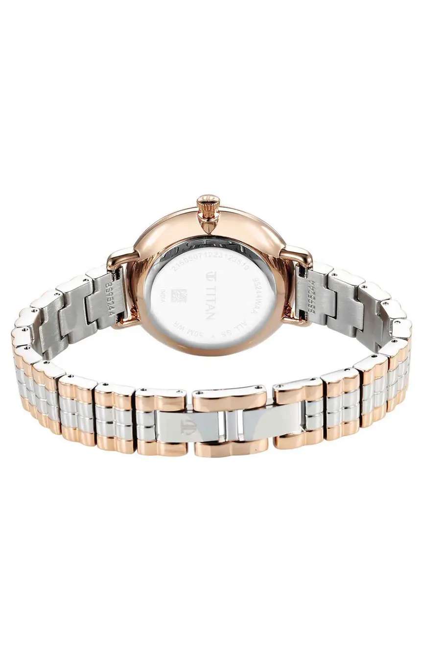 تيتان ساعة تيتان أورا كوارتز بميناء فضي وسوار ستانلس إستيل للنساء