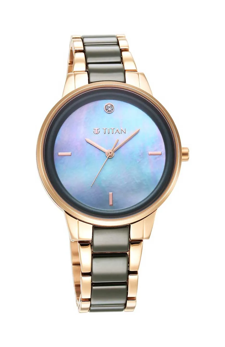 

Titan | Titan Purple Ceramics Green Dial Analog Steel and Ceramic Strap watch for Women